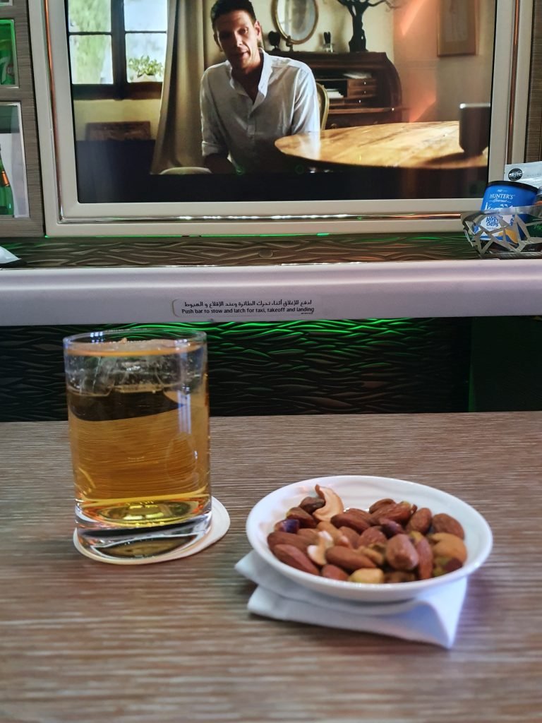 Emirates Change Changer First Class Pre meal drink more warm nuts Emirates Change Changer First Class Pre meal drink more warm nuts