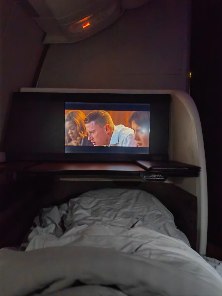 JAL First Class Watching Movie in Bed