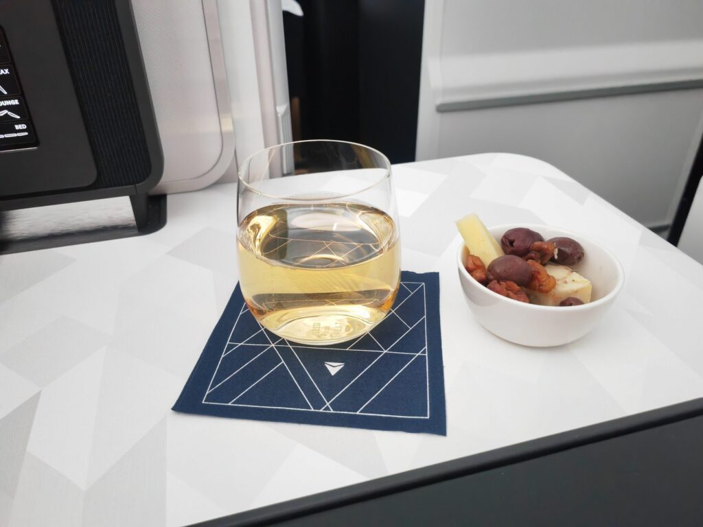 Delta One Suites Post Take off Champagne