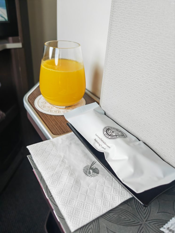 Qatar Airways First Class To Amman Welcome Drink & Refreshing Towel