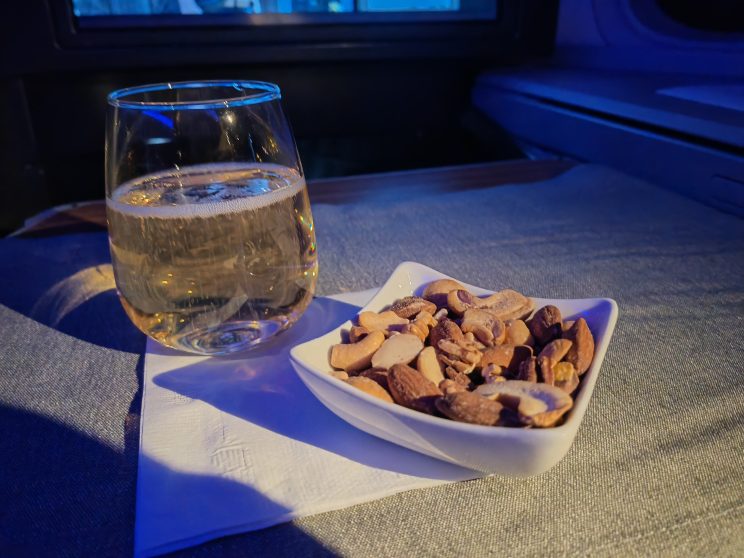 American Flagship Business Post Take Off Drinks & Almonds